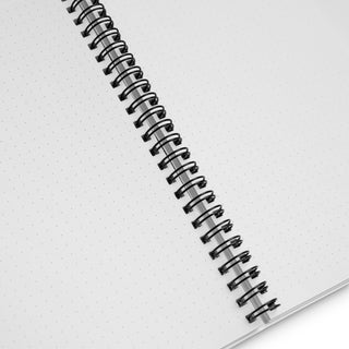 A spiral Notebook with dotted Pages Interior