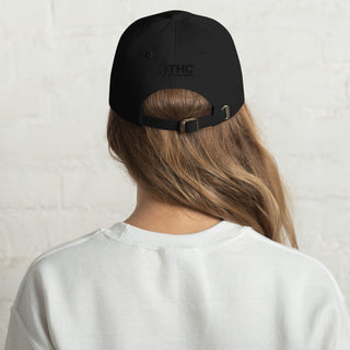 The Happy Channel® black dad hat featuring black embroidered logo on back
