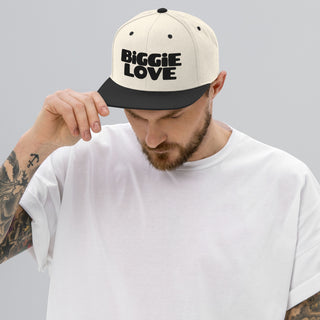 Man wearing The Happy Channel® BIGGIE LOVE Snapback Hat in Natural and Black colorway, front view