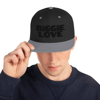 Man wearing Black and Silver BiGGiE LOVE snapback hat