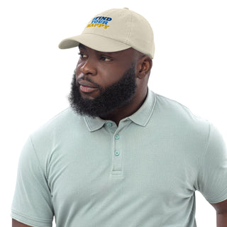 Man wearing The Happy Channel® #FindYourHappy embroidered beige hat