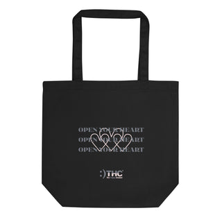 The Happy Channel® Open Your Heart Eco Tote Bag back view with signature logo