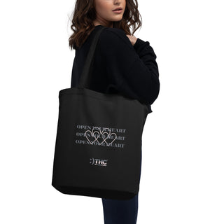 The Happy Channel® Open Your Heart Eco Tote Bag worn by model, back view
