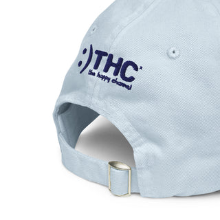 Back of pastel blue hat embroidered with The Happy Channel® logo