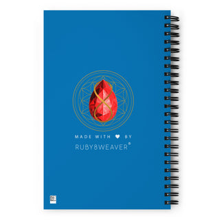 A spiral notebook with flower of life geometric design on white background 