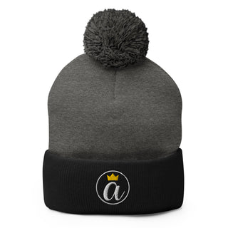 Dark heather grey and black Already Regis® Crowned Pom-Pom Beanie with embroidered crown design
