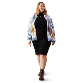 Woman wearing the Already Regis® Luminous Petals Unisex Bomber Jacket with watercolor floral print