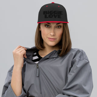 Woman wearing Black and Red BiGGiE LOVE snapback hat