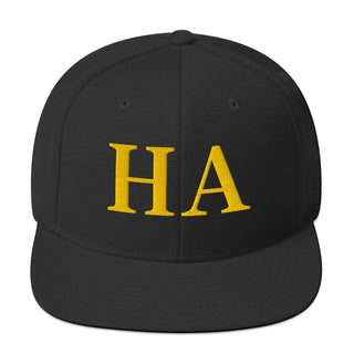 Black The Happy Channel® HA Snapback Hat with gold HA embroidery