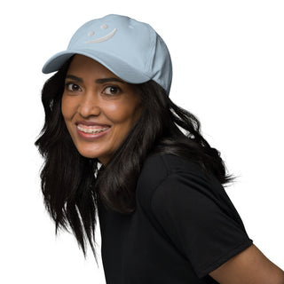 Woman wearing The Happy Channel® Smile Dad Hat in Sky Blue